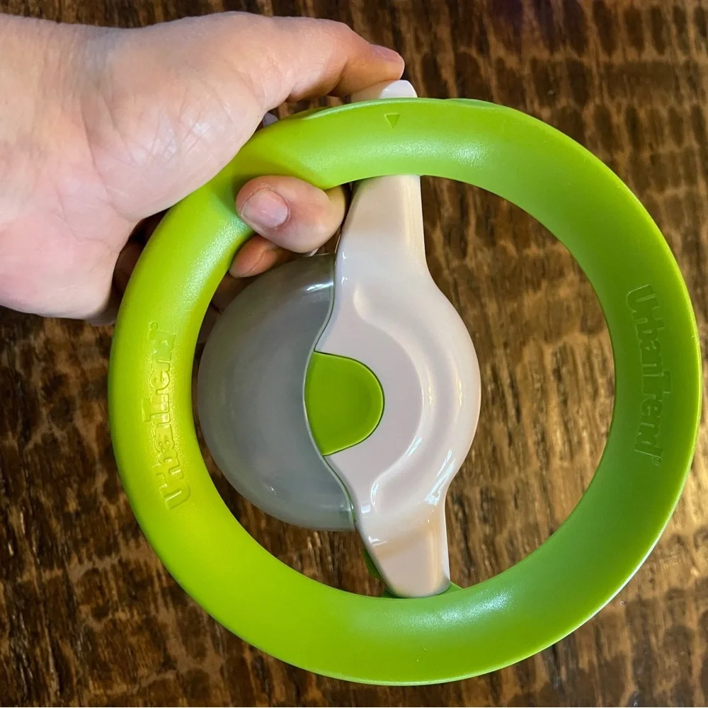 Green and White Rolling Herb Cutter
